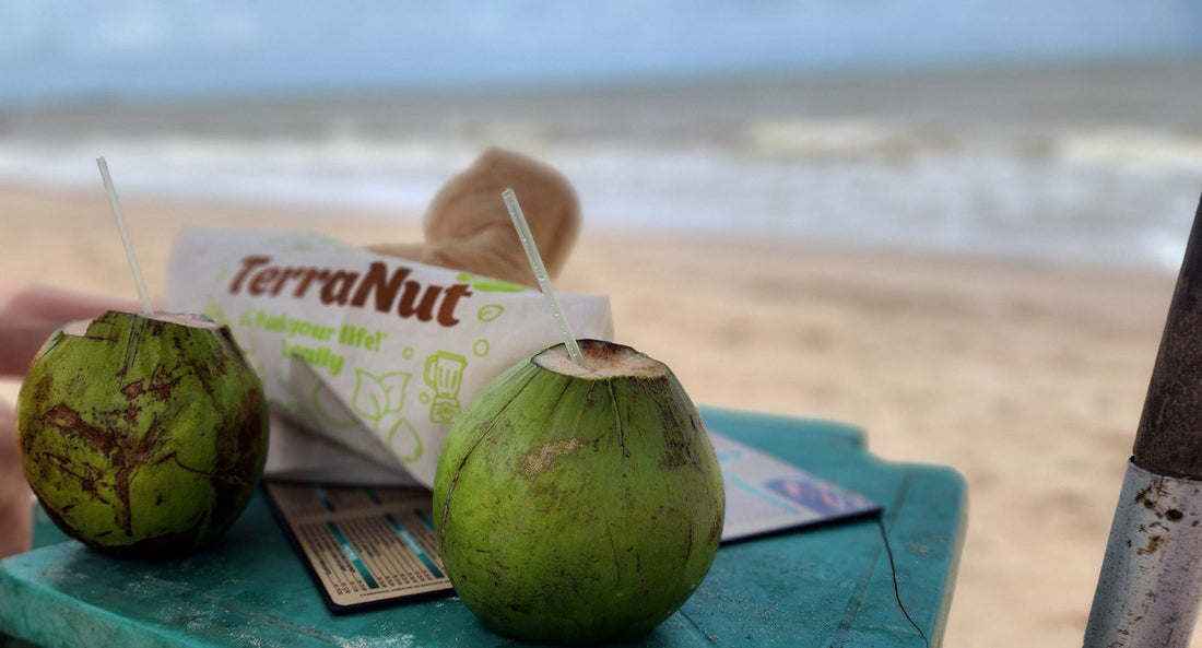 A beautiful beach scene, with our product logo and exotic fruit.