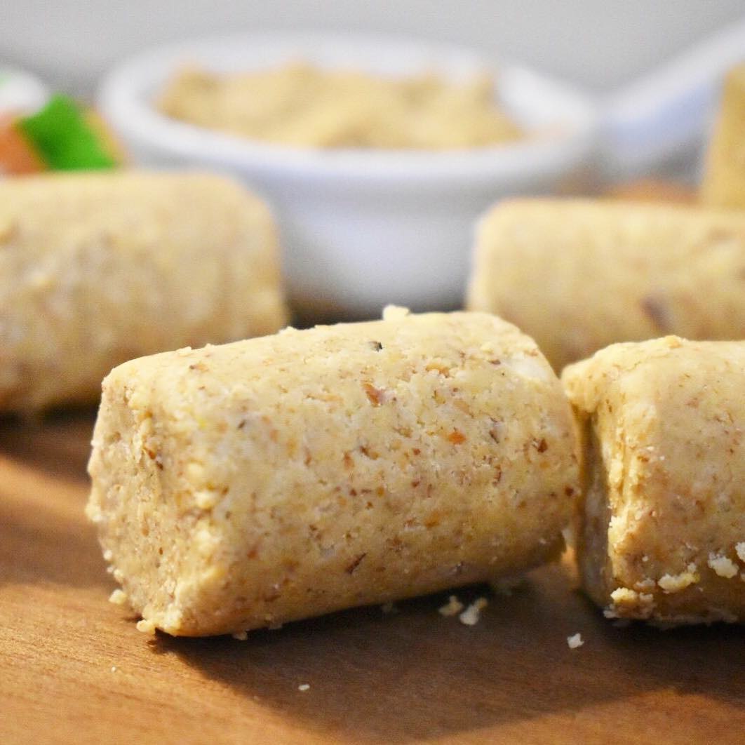 Close-up of a TerraNut cold-pressed snack made from simple, real ingredients, showing its natural texture and artisanal shape.