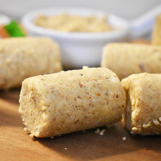 Close-up of a TerraNut cold-pressed snack made from simple, real ingredients, showing its natural texture and artisanal shape.