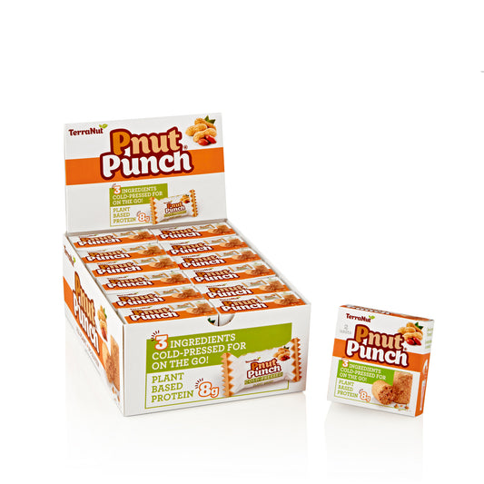A large retail display box filled with individual TerraNut Pnut Punch snacks alongside a smaller 2-pack box, highlighting 8g of plant-based protein and three cold-pressed ingredients.